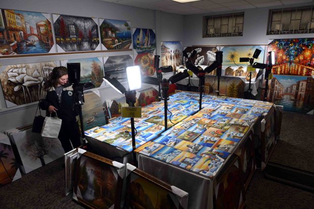 Seven artists' works are displayed for sale during the Greek Food Festival on Saturday at Sts. Constantine and Helen Greek Orthodox Church, 1001 E. Wyomissing Blvd. (BILL UHRICH/READING EAGLE)