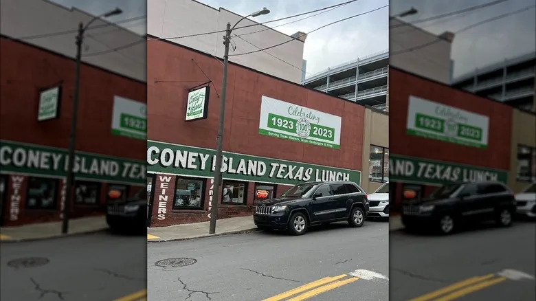 Car parked outside The Original Coney Island of Scranton restaurant