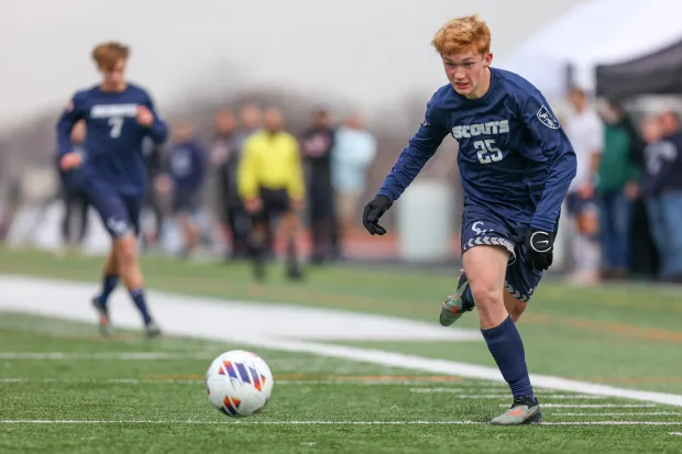 Conrad Weiser’s Sebastian Knoll (25) gives chase to the ball...