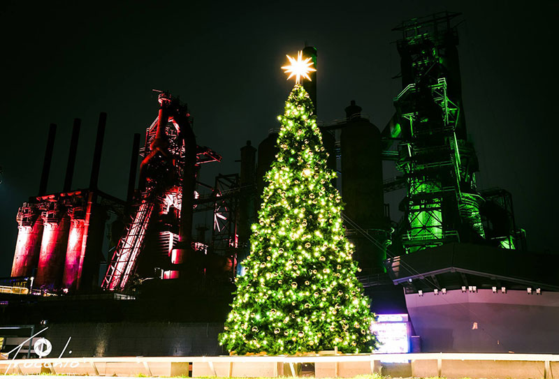The glowing green Christmas tree with a bright big star on top in Bethlehem, PA