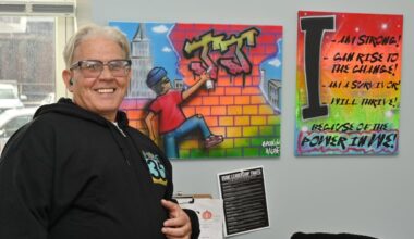 Nephtali Andujar, 61, shows off some of his art work in a room provided by Project HOME. "You are not just helping the homeless,” he said of those who donate to the group. “You are helping the city. You are helping humanity.”
