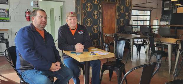 Left to right, John Rosengrant, executive director of the NEPA...