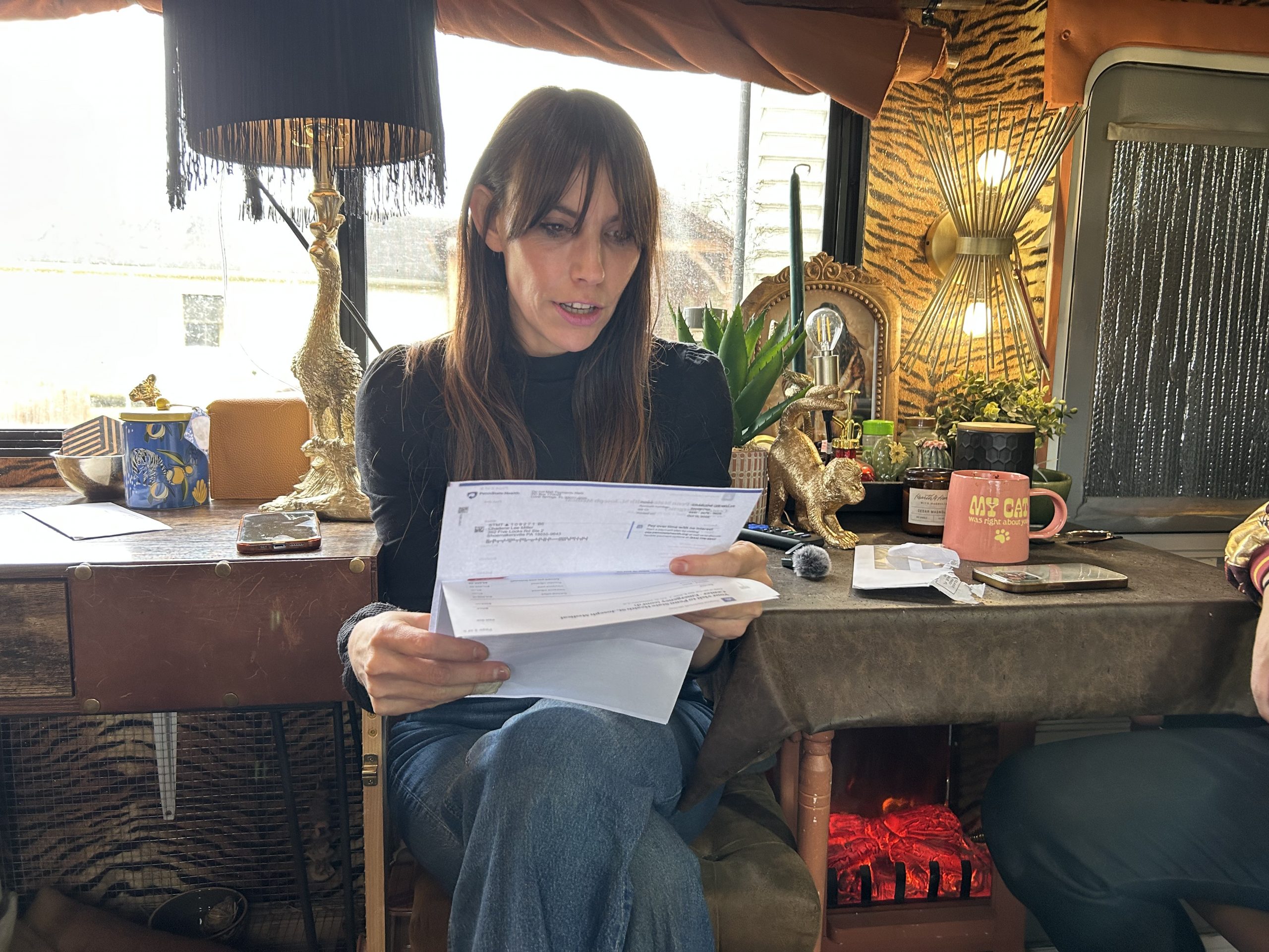 Charlie Miller of Perry Township in the RV she shares with Kameron Biehl.