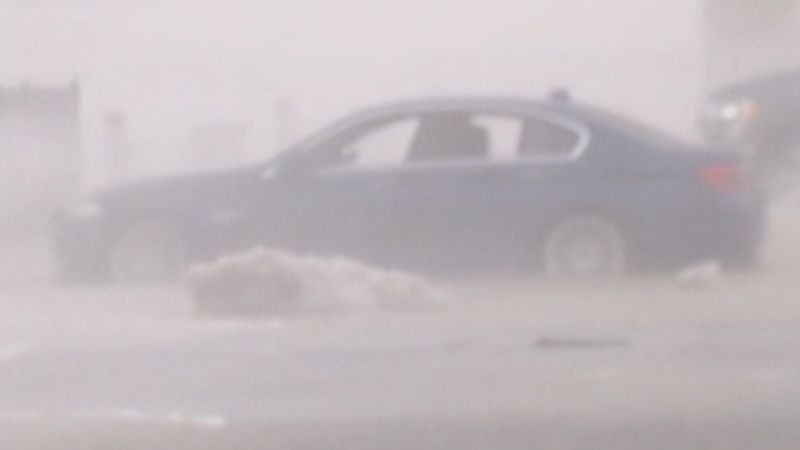 Strong winds from storm whip up massive waves on Lake Erie