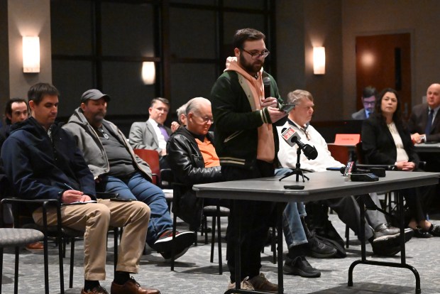 Jermyn resident Jordan Moran speaks during the public input hearing regarding the rate change proposed by PPL at the University of Scranton on Monday, Dec. 8, 2025. (REBECCA PARTICKA/STAFF PHOTOGRAPHER)