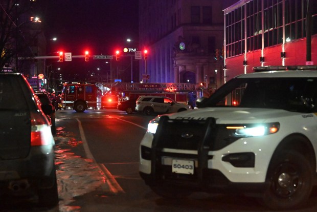 First responders block Biden St. while responding to a reported stabbing at Hotel Jermyn in Scranton on Tuesday, Dec. 9, 2025. (REBECCA PARTICKA/STAFF PHOTOGRAPHER)