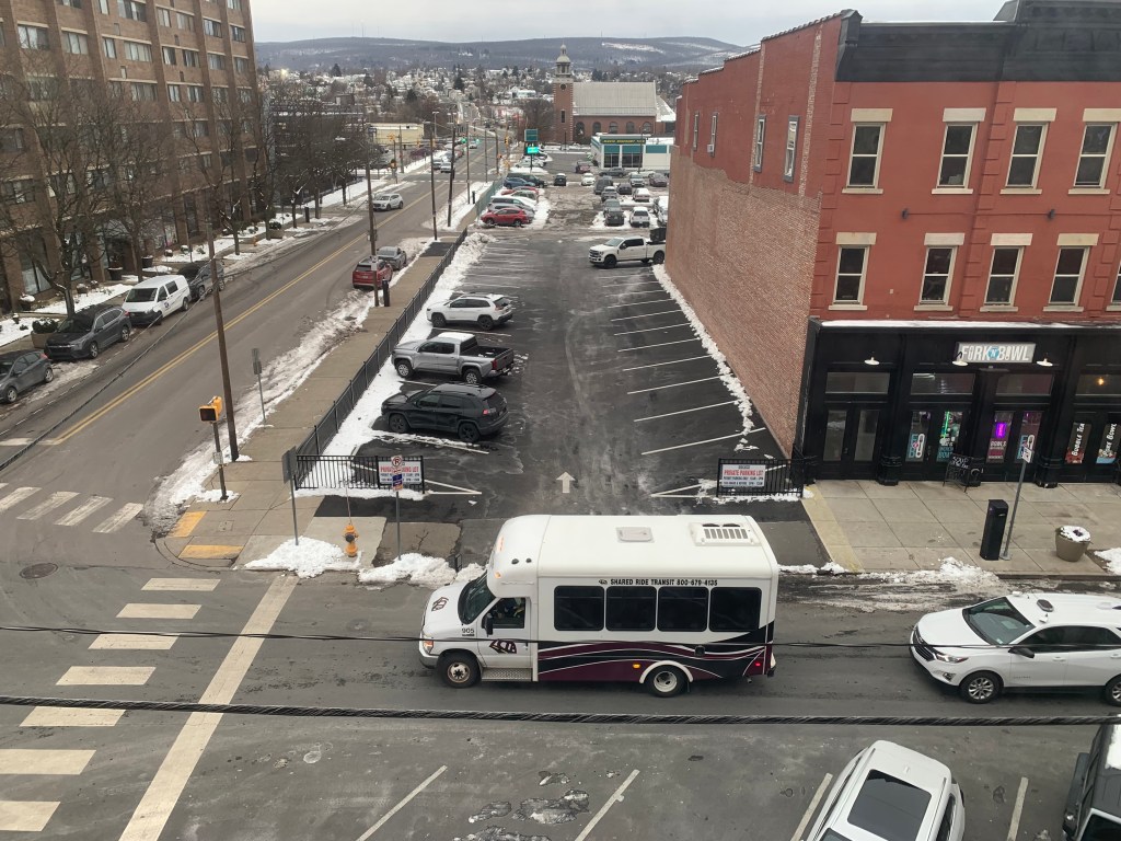 Scranton developer on defense over fence erected at downtown parking lot