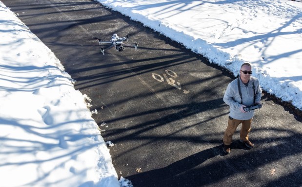 Johnny Lubeck, owner of NEPA Drone, hovers his DJI Matrice drone in the Blakely Borough Recreational Complex in Peckville Thursday, December 18, 2025. (SEAN MCKEAG / STAFF PHOTOGRAPHER)