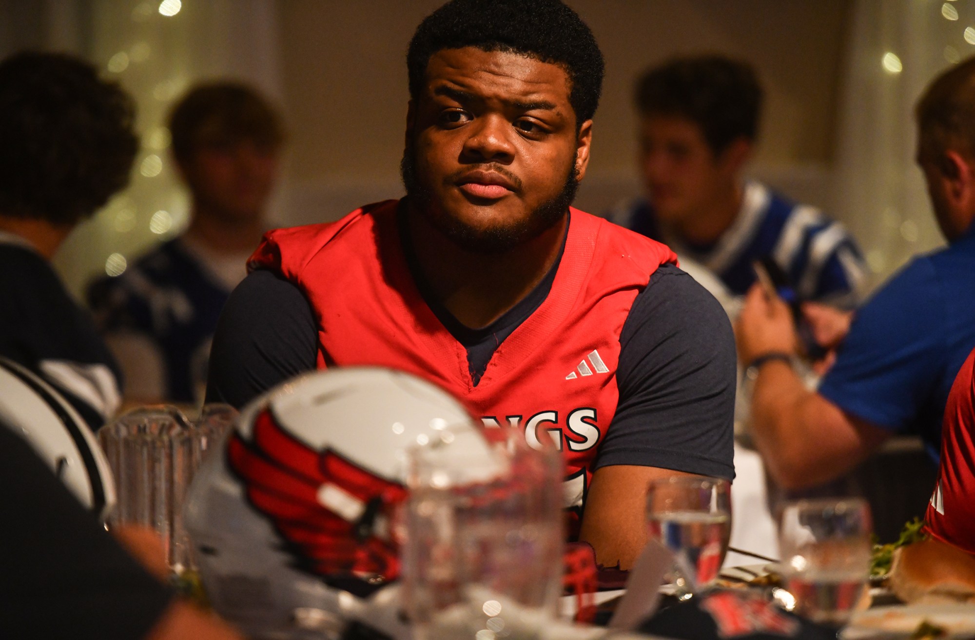 Riverside lineman Tavian Branch talks with players and coaches during...