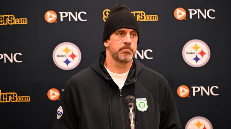 Pittsburgh Steelers quarterback Aaron Rodgers speaks during a news conference...