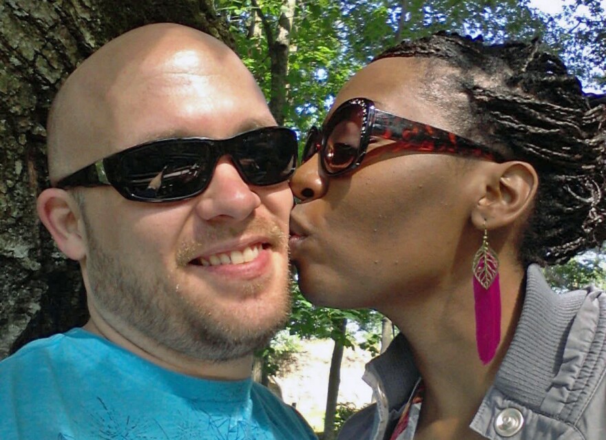 Jeffrey and Keisha Moeller are seen in a family photo. Jeffrey, an employee at the Lowe's store on Viewmont Drive, was shot and killed early Saturday, June 14 while at work. A coworker has been charged in connection with his death.