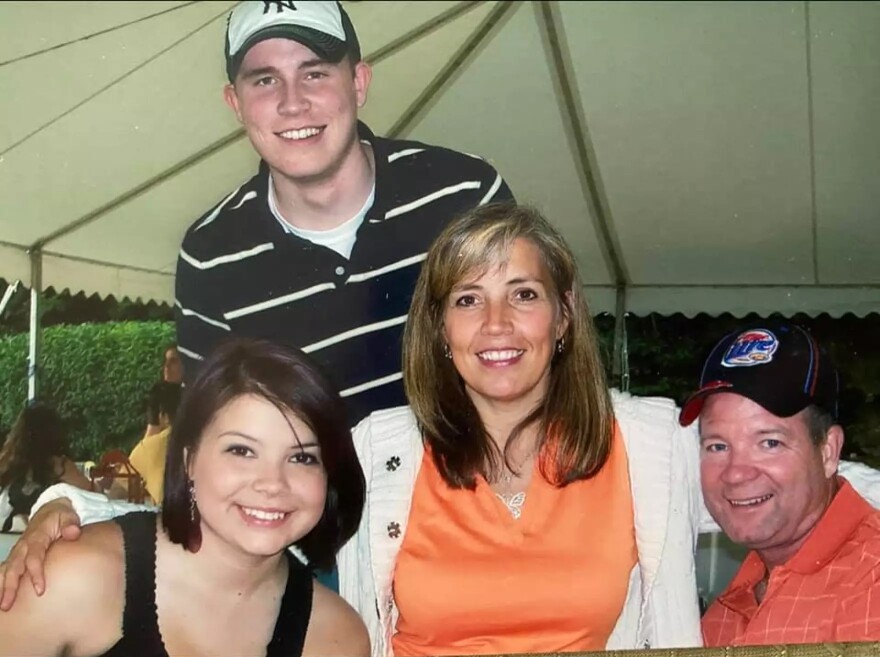 Paul Miller, top, was the Scranton man for whom Pennsylvania's new distracted driving law is named. Miller, 21, was killed by a distracted tractor-trailer driver in Monroe County in 2010. He is seen in this family photo with, from left, sister Nicole; mother, Eileen; and father, Paul Sr. 'I was just so proud and honored to be his mom,' said Eileen Miller, who fought for over a decade to see the law passed.