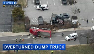 Dump truck overturns after crash on West Chester Pike in Upper Darby