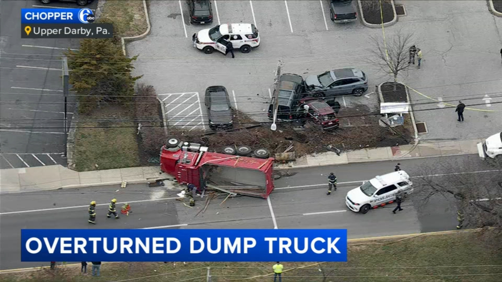 Dump truck overturns after crash on West Chester Pike in Upper Darby