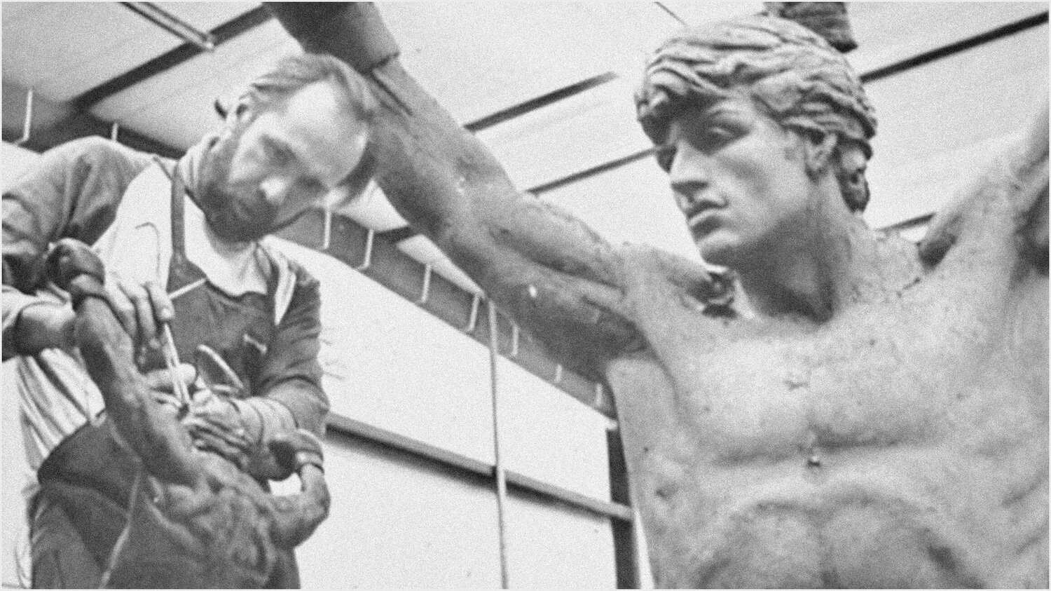 A. Thomas Schomberg, the sculptor of the famed Rocky statue, is pictured along with a small-scale version of the statue and the famed piece that now sits outside the Philadelphia Art Museum.