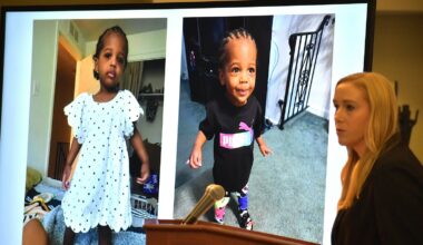 Video boards show images of 2-year-old Key&rsquo;Monnie Bean as Assistant District Attorney Ashley Toczylowski speaks about the investigation into her death during a news conference Thursday, Dec. 18, 2025.