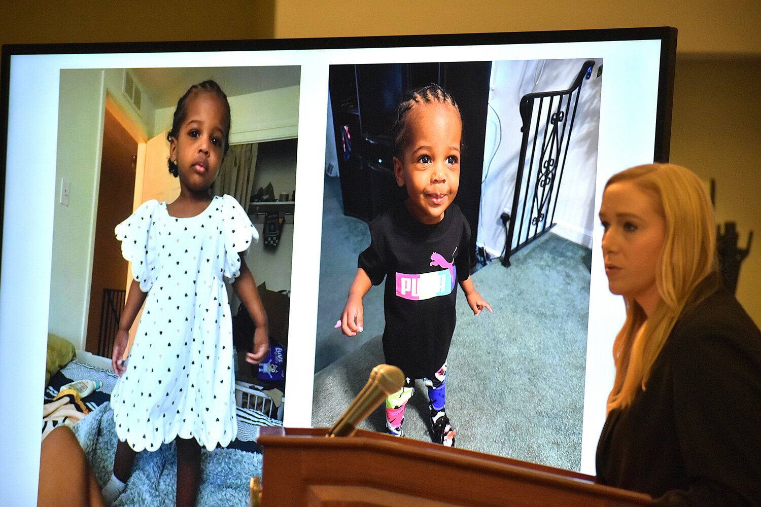 Video boards show images of 2-year-old Key&rsquo;Monnie Bean as Assistant District Attorney Ashley Toczylowski speaks about the investigation into her death during a news conference Thursday, Dec. 18, 2025.