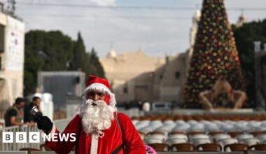 Bethlehem Christmas tree lights up for first time since start of Gaza war