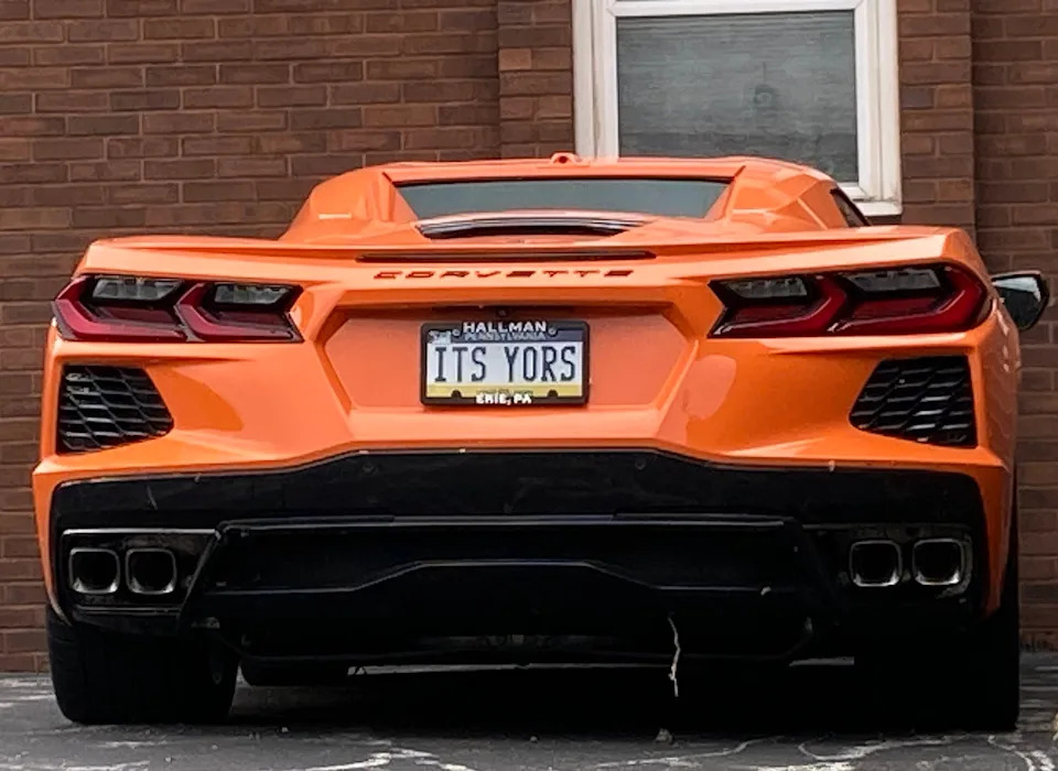 A 2024 Chevrolet Corvette Stingray sports car was stored outside a garage at St. Jude the Apostle Church in Millcreek Township on Aug. 12. The car was the grand prize of the Roman Catholic church's 2024 raffle, in which the pastor at the time told investigators he made up the winner's name.