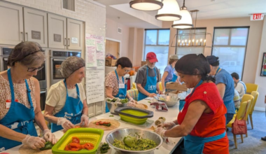 Members of the Lower Merion Village volunteer at the Jewish Family and Children's Services food pantry in Bala Cynwyd in November. The Lower Merion Village offers social activities and volunteer opportunities for older adults and people with disabilities in the Main Line community.