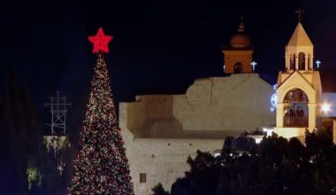 In first celebration since the Gaza war, Bethlehem’s Christmas tree shines bright