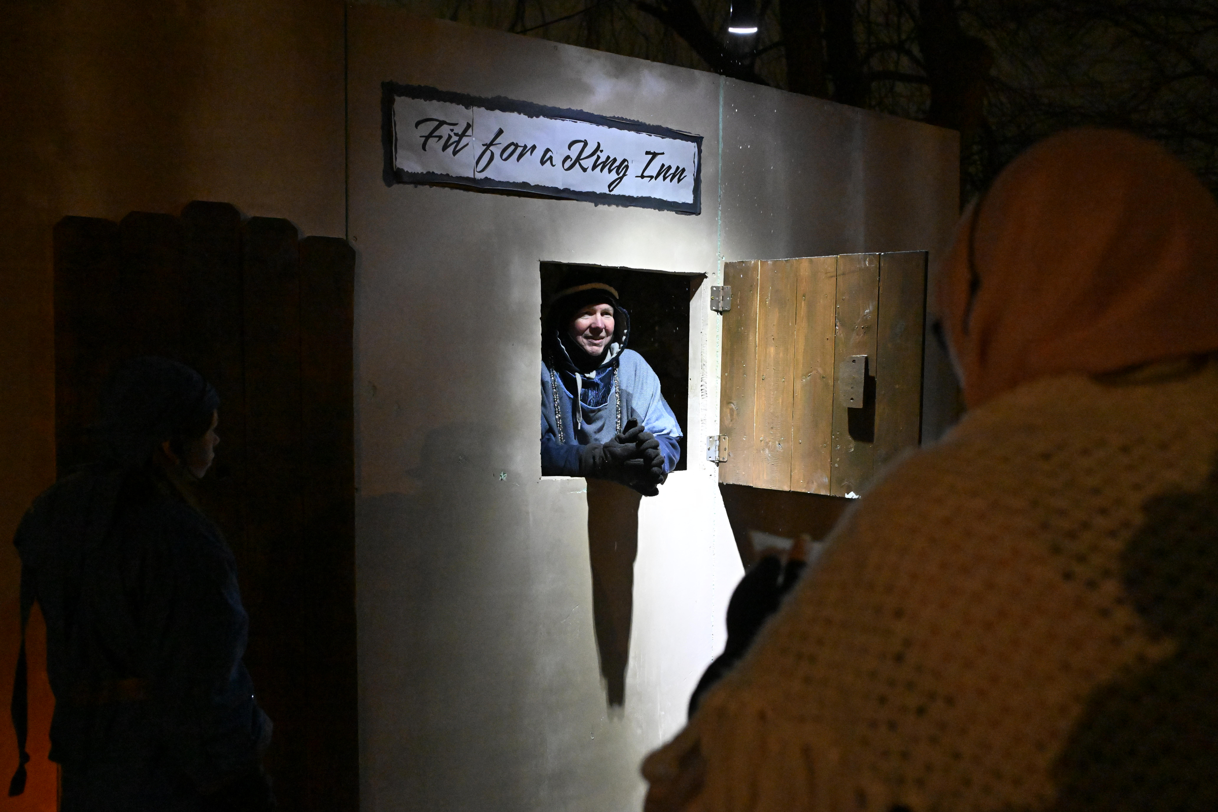 The inn keeper greets visitors during "A Night in Bethlehem" at Westminster United Methodist Church. (Thomas Walker/Freelance)