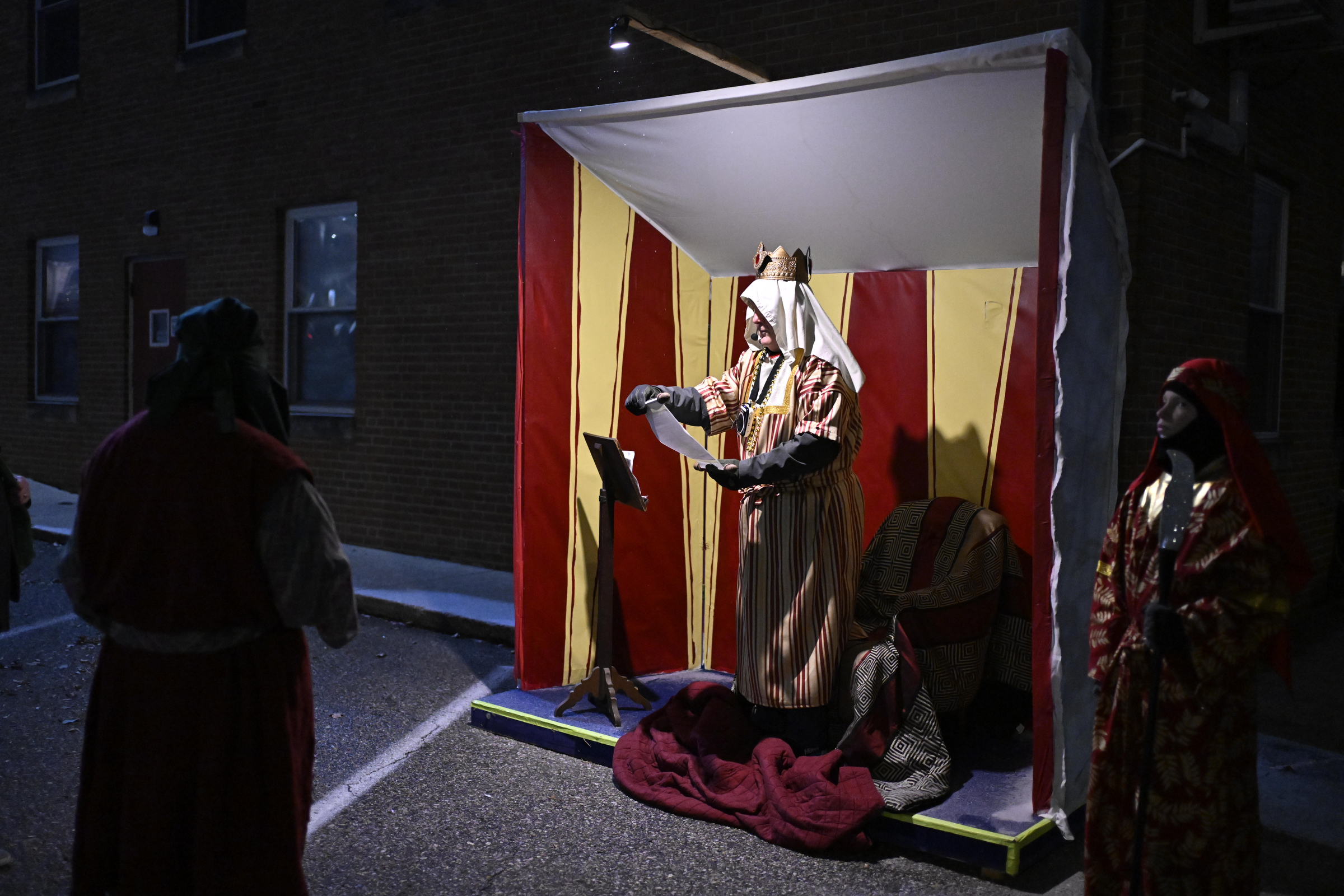 Herod, played by John Yingling, reads from a scroll during "A Night in Bethlehem" at Westminster United Methodist Church. (Thomas Walker/Freelance)