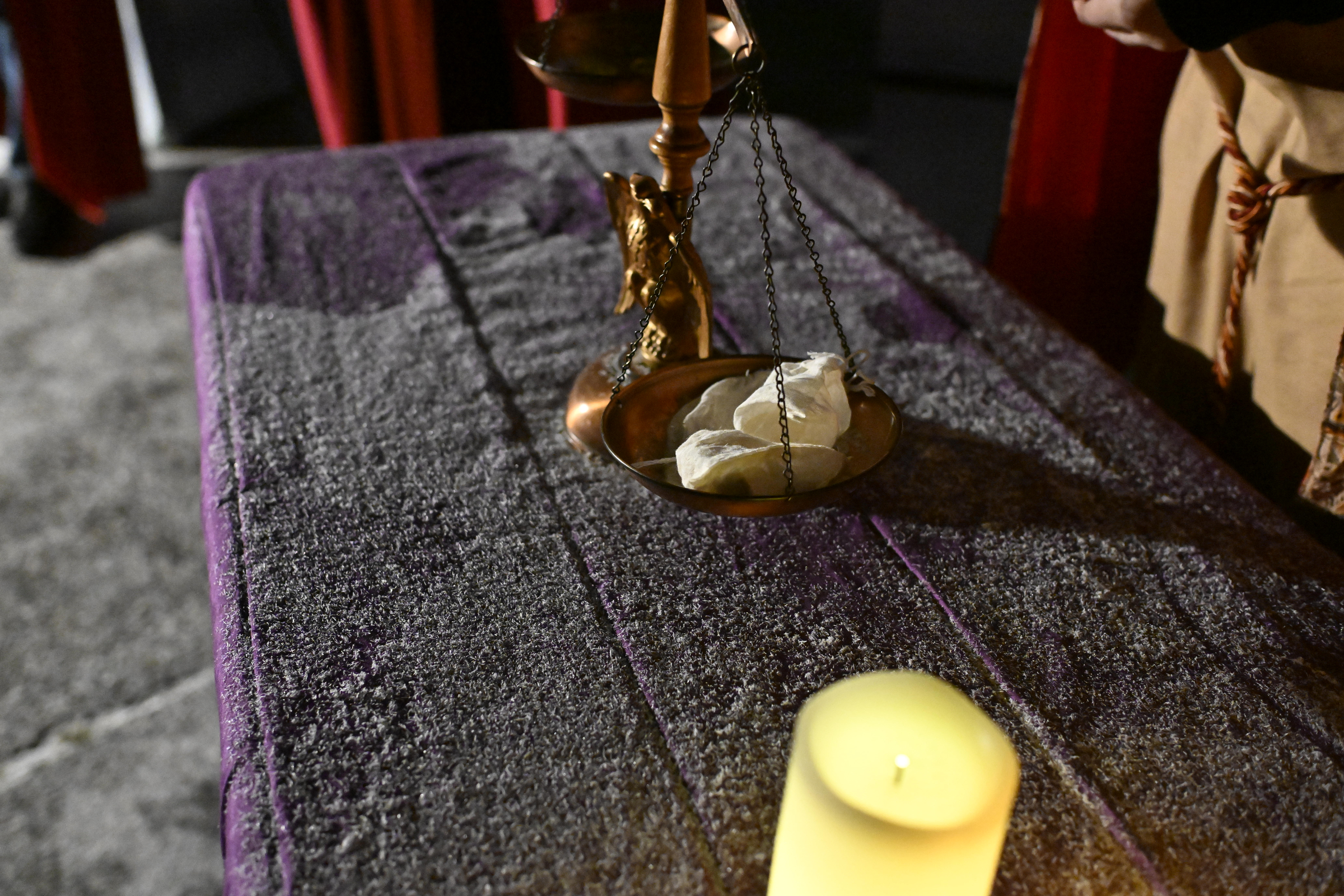 Sheckles are collected by the tax collector during "A Night in Bethlehem" at Westminster United Methodist Church. (Thomas Walker/Freelance)