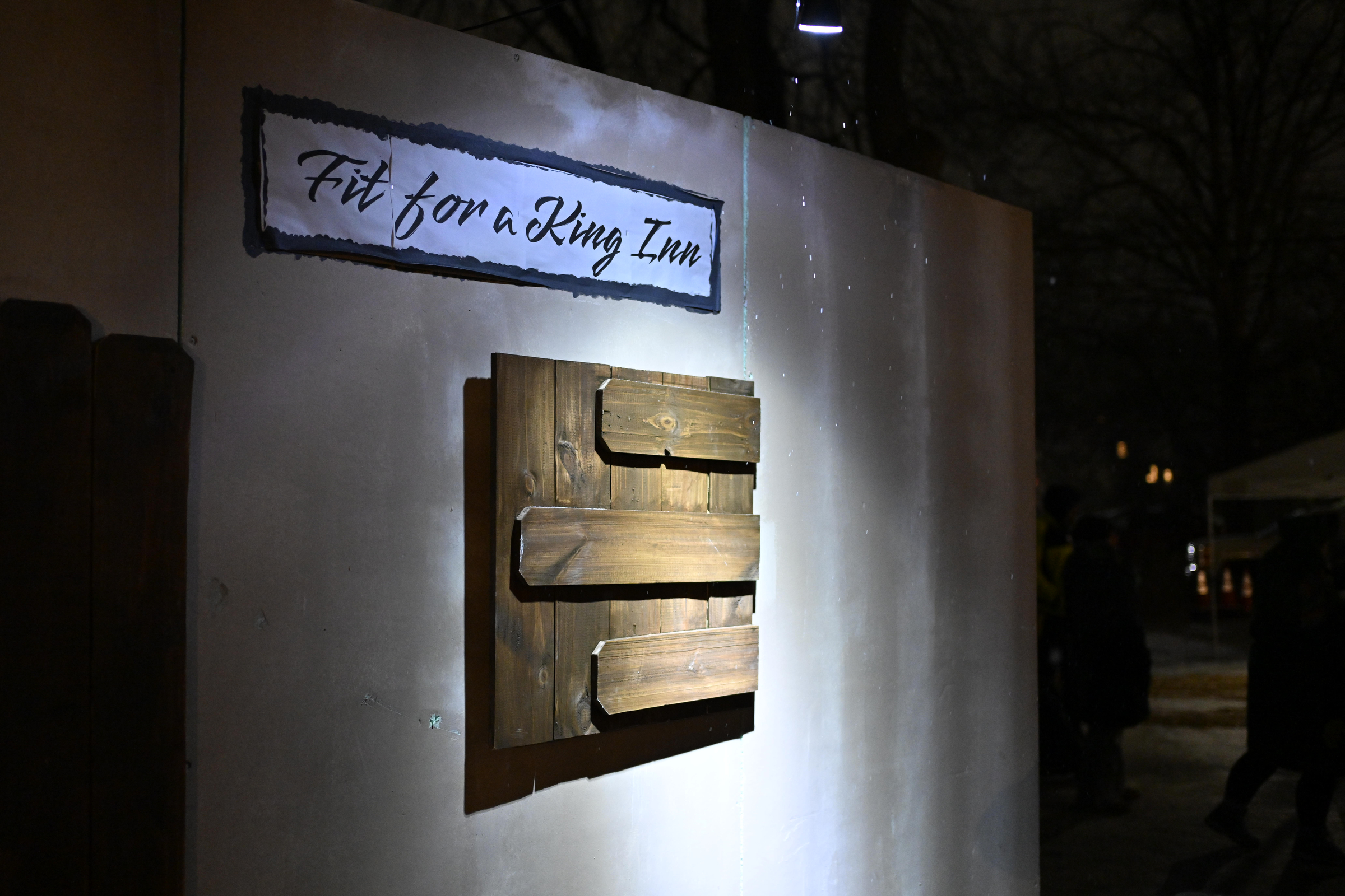 Snow falls on the Fit for a King Inn during "A Night in Bethlehem" at Westminster United Methodist Church. (Thomas Walker/Freelance)