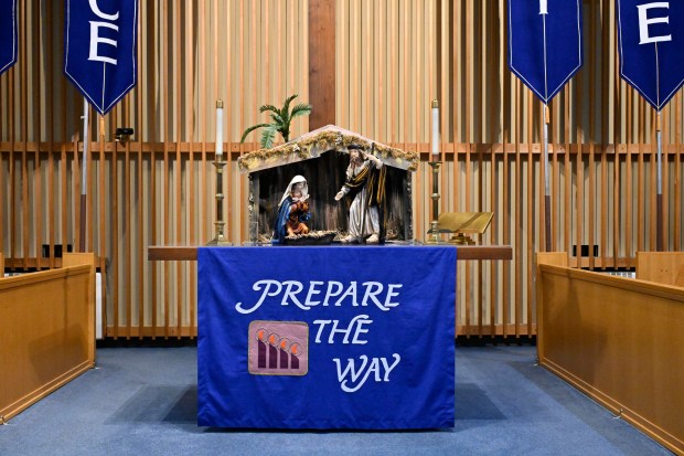 A manger scene on the alter greets visitors during "A Night in Bethlehem" at Westminster United Methodist Church. (Thomas Walker/Freelance)