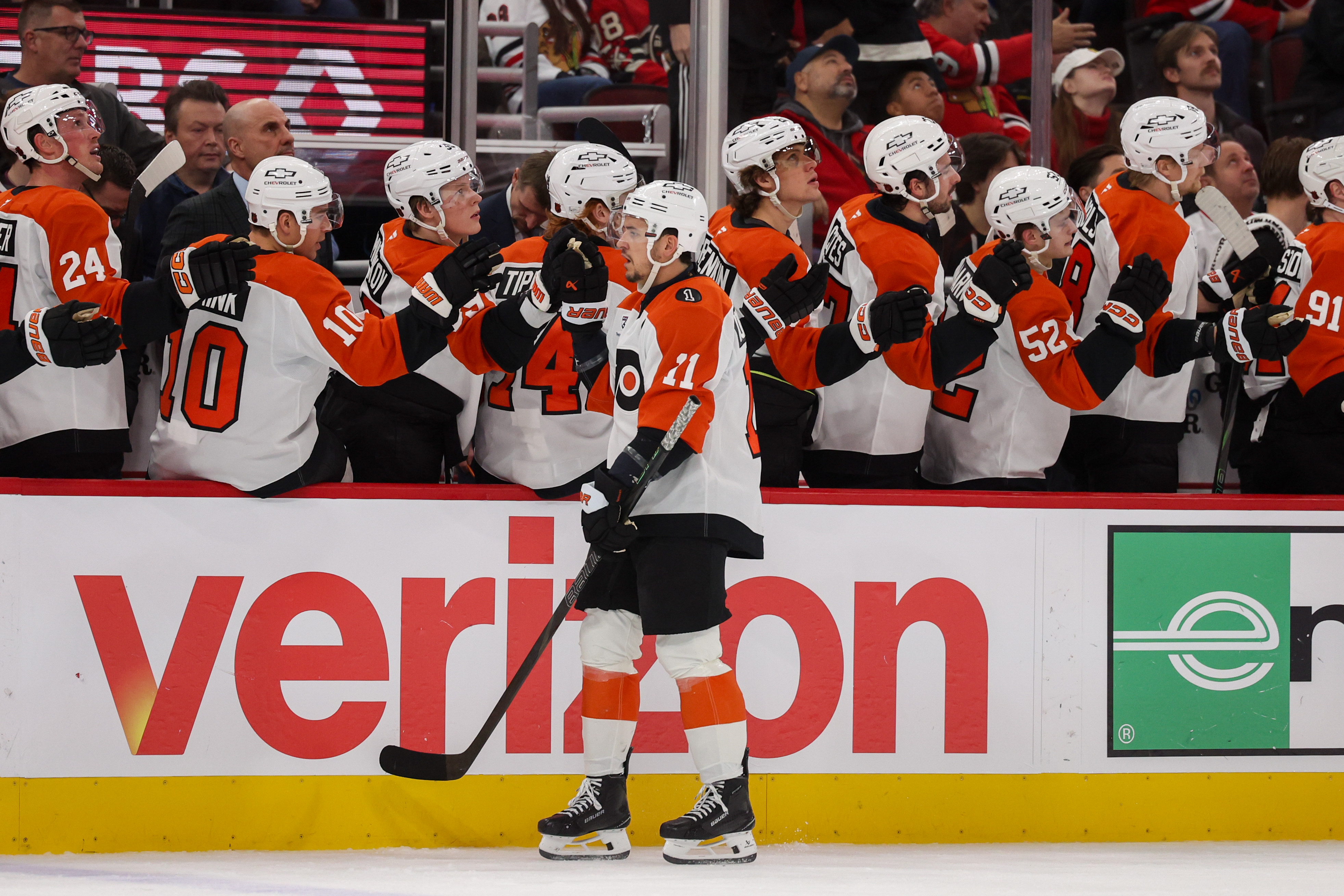 Philadelphia Flyers right wing Travis Konecny (11) celebrates with his team after scoring a goal during the first period against the Chicago Blackhawks at the United Center Tuesday Dec. 23, 2025 in Chicago. (Armando L. Sanchez/Chicago Tribune)