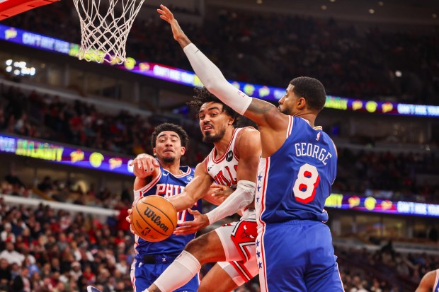 Chicago Bulls guard Tre Jones (30) tries to pass the ball in the second quarter during a game against the Philadelphia 76ers, Friday, Dec. 26, 2025, at the United Center in Chicago. (Dominic Di Palermo/Chicago Tribune)