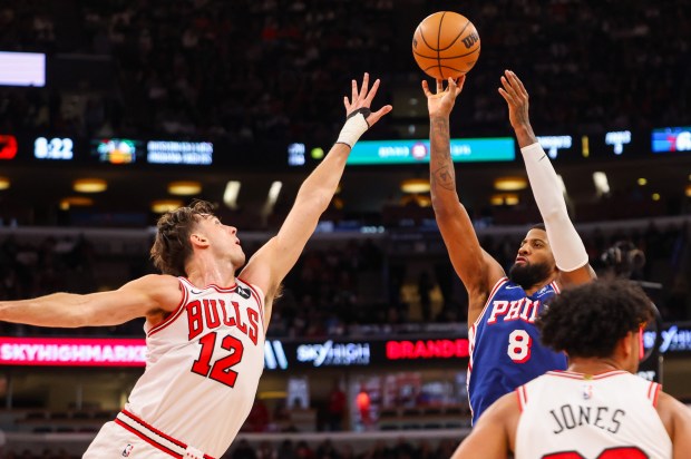 Philadelphia 76ers forward Paul George (8) shoots the ball in the third quarter during a game against the Bulls, Friday, Dec. 26, 2025, at the United Center in Chicago. (Dominic Di Palermo/Chicago Tribune)