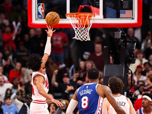 Chicago Bulls guard Tre Jones (30) scores a layup in the fourth quarter during a game against the Philadelphia 76ers, Friday, Dec. 26, 2025, at the United Center in Chicago. (Dominic Di Palermo/Chicago Tribune)