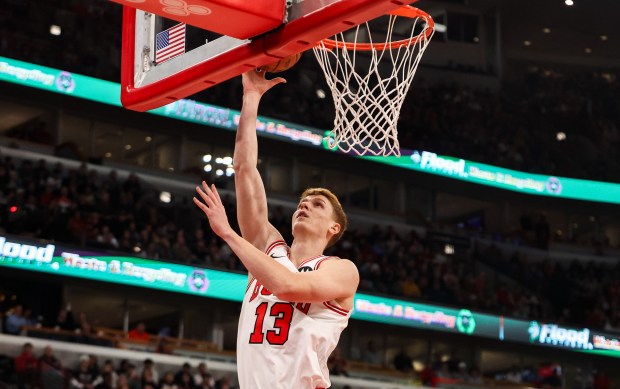 Chicago Bulls guard/forward Kevin Huerter (13) makes a layup in the first quarter during a game against the Philadelphia 76ers, Sunday, Dec. 26, 2025, at the United Center in Chicago. (Dominic Di Palermo/Chicago Tribune)
