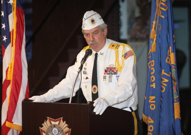 AMVETS Poat 189 Commander  Bernie McDonald adresses fellow veterans at the start of a Pearl Harbor Remembrance Program held at the  Dupont Veterans of Foreign Wars Post 4909 Sunday morning December 7th 2025.