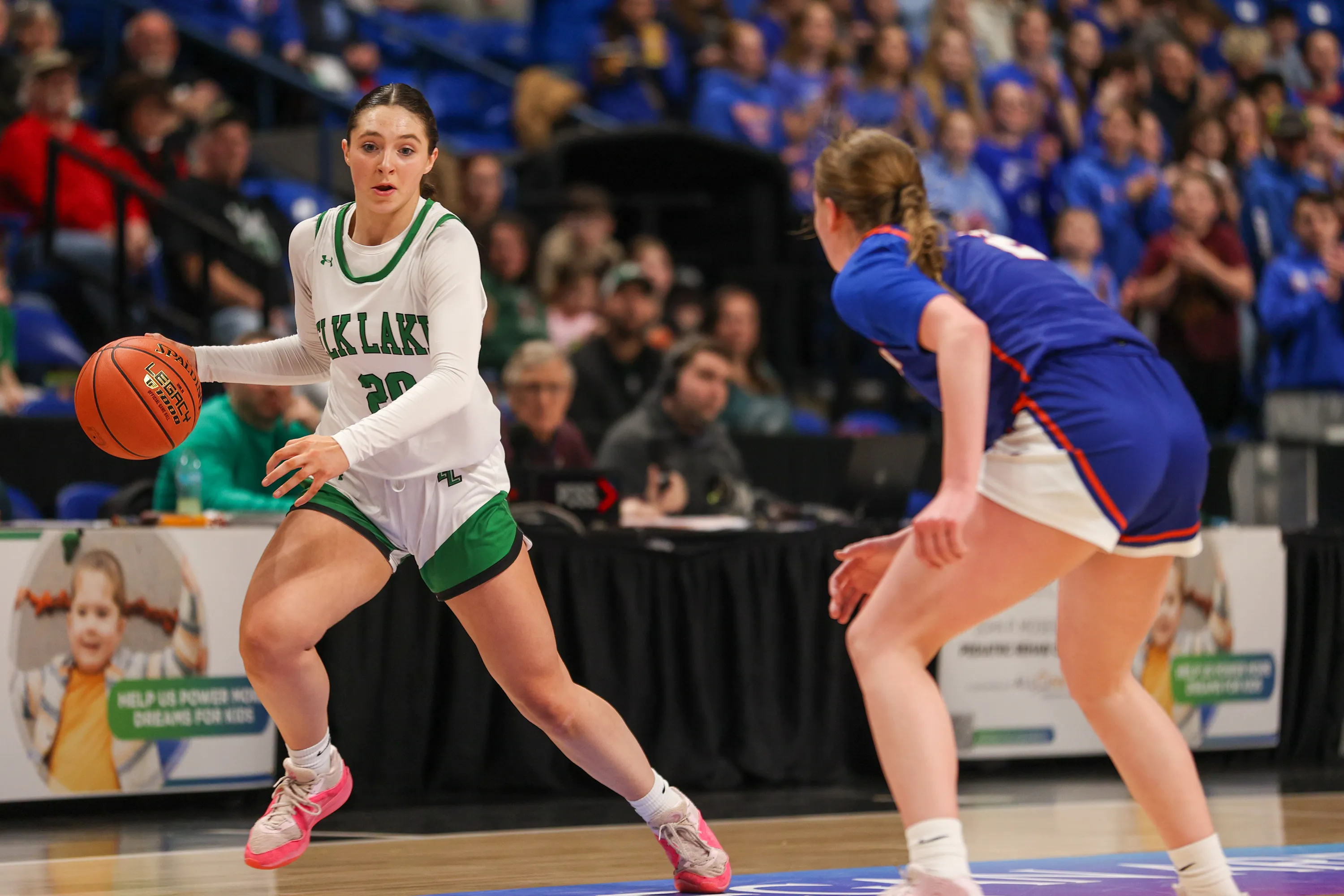 Elk Lake’s Kylie Shingler attempts to evade a defender during...