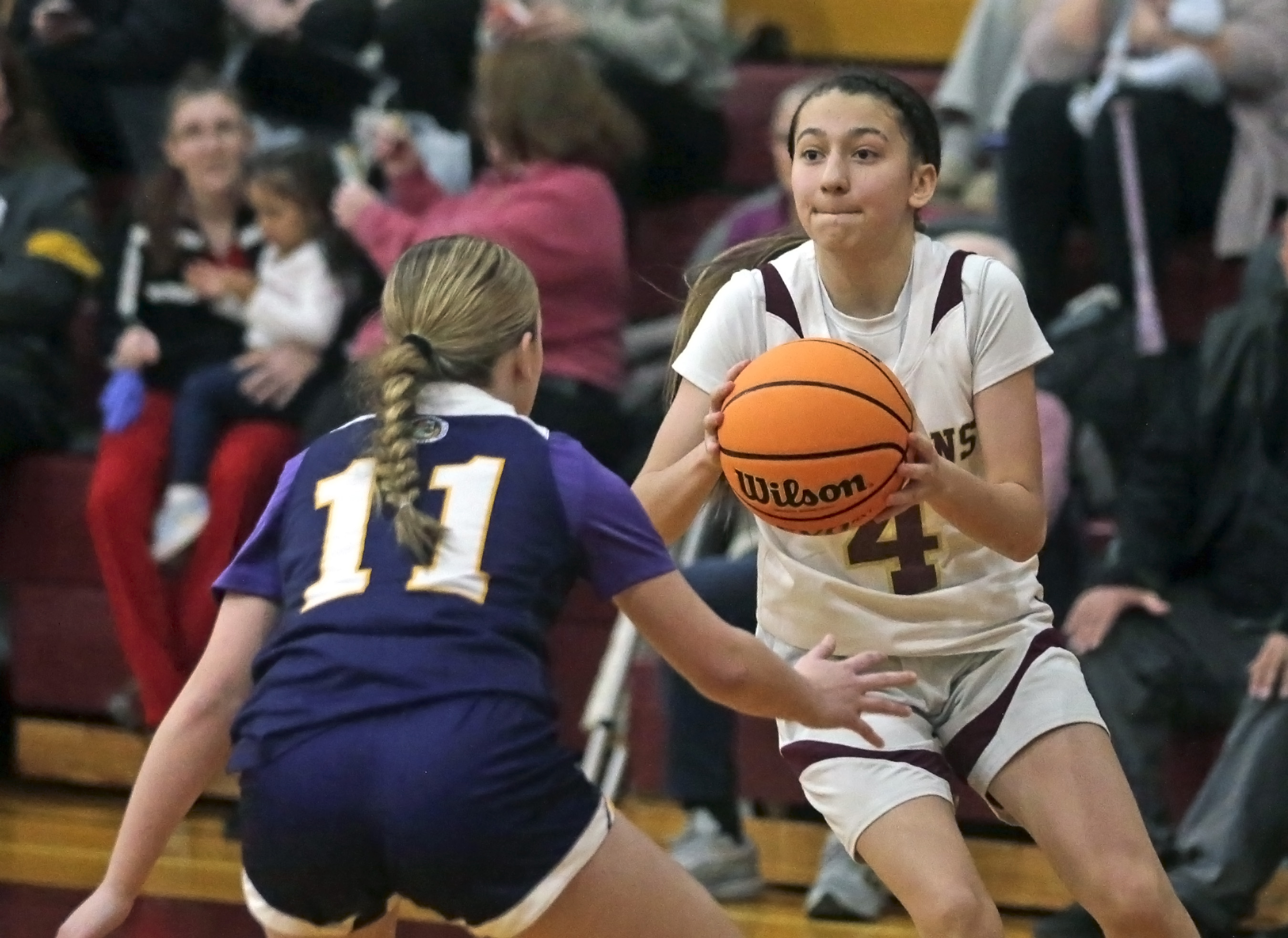 Wyoming Valley West’s Jayla Campoverde, right, looks to shoot against...