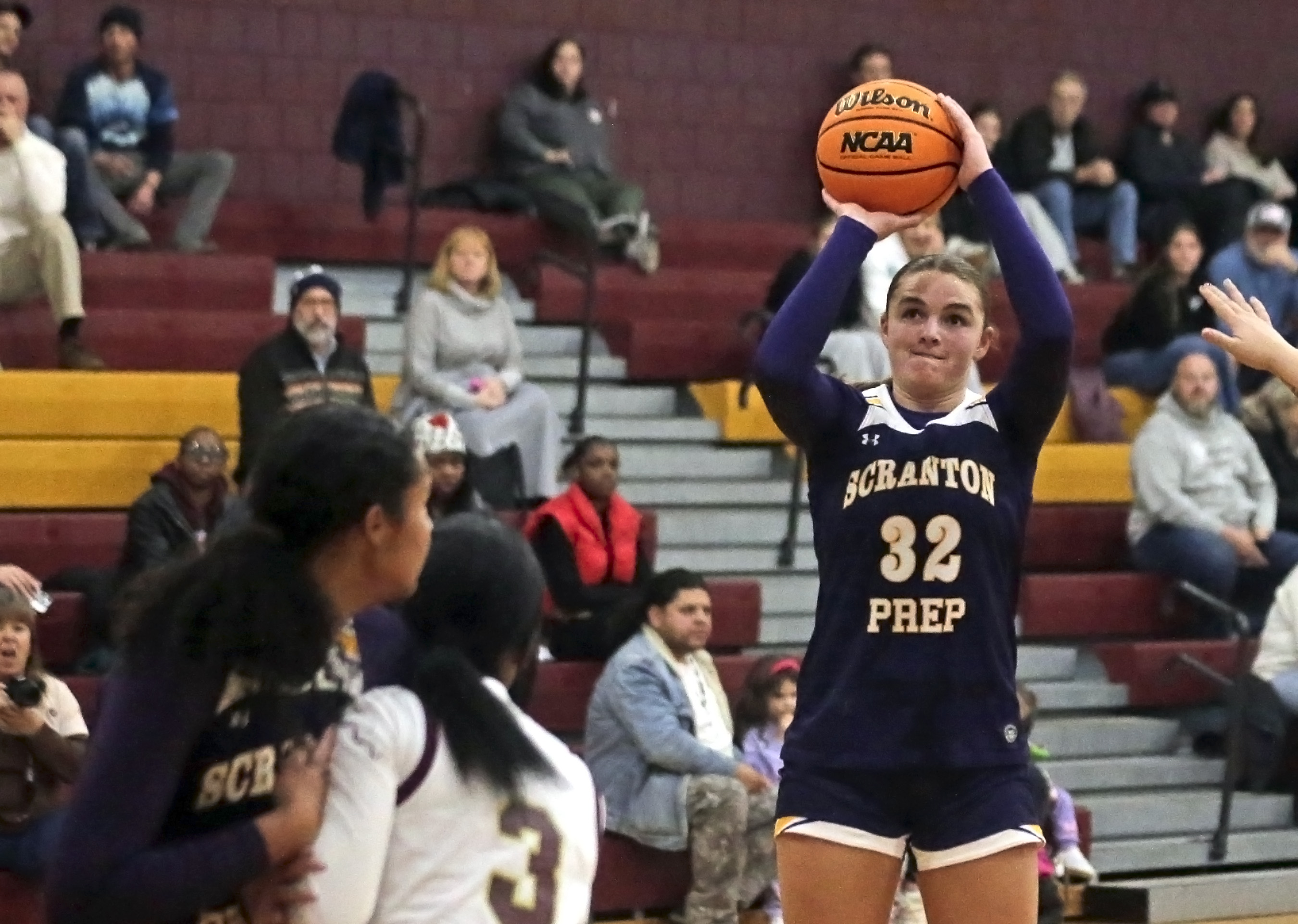 Scranton Prep’s Chloe Mamera (32) shoots against Wyoming Valley West...