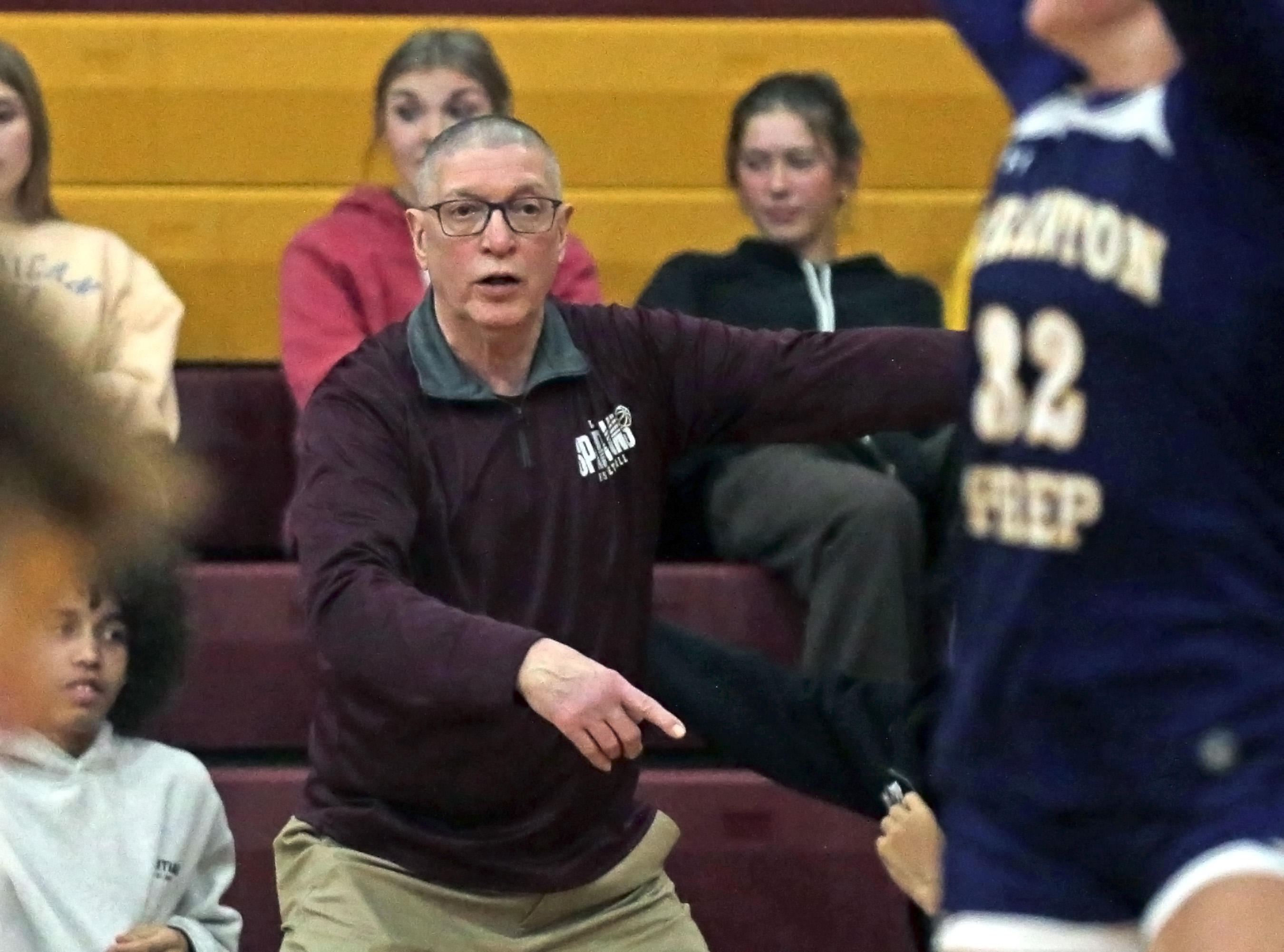 Wyoming Valley West head girls basketball coach Gary Ferenchick shouts...