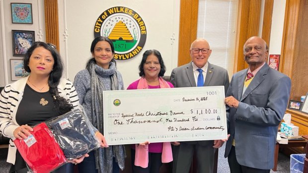 From left, are Pennsylvania's Asian Indian Community  members Mona Pande, Lalitha Sarada and Uma Srinivasan with Wilkes-Barre Mayor George Brown, and Pennsylvania's Asian Indian Community member Dr. Srinivasan. SUBMITTED SUBMITTED