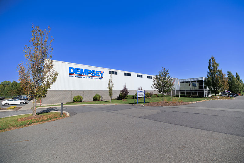 Exterior of Dempsey Uniform & Linen Supply’s Jessup, Pennsylvania, plant on a clear day.