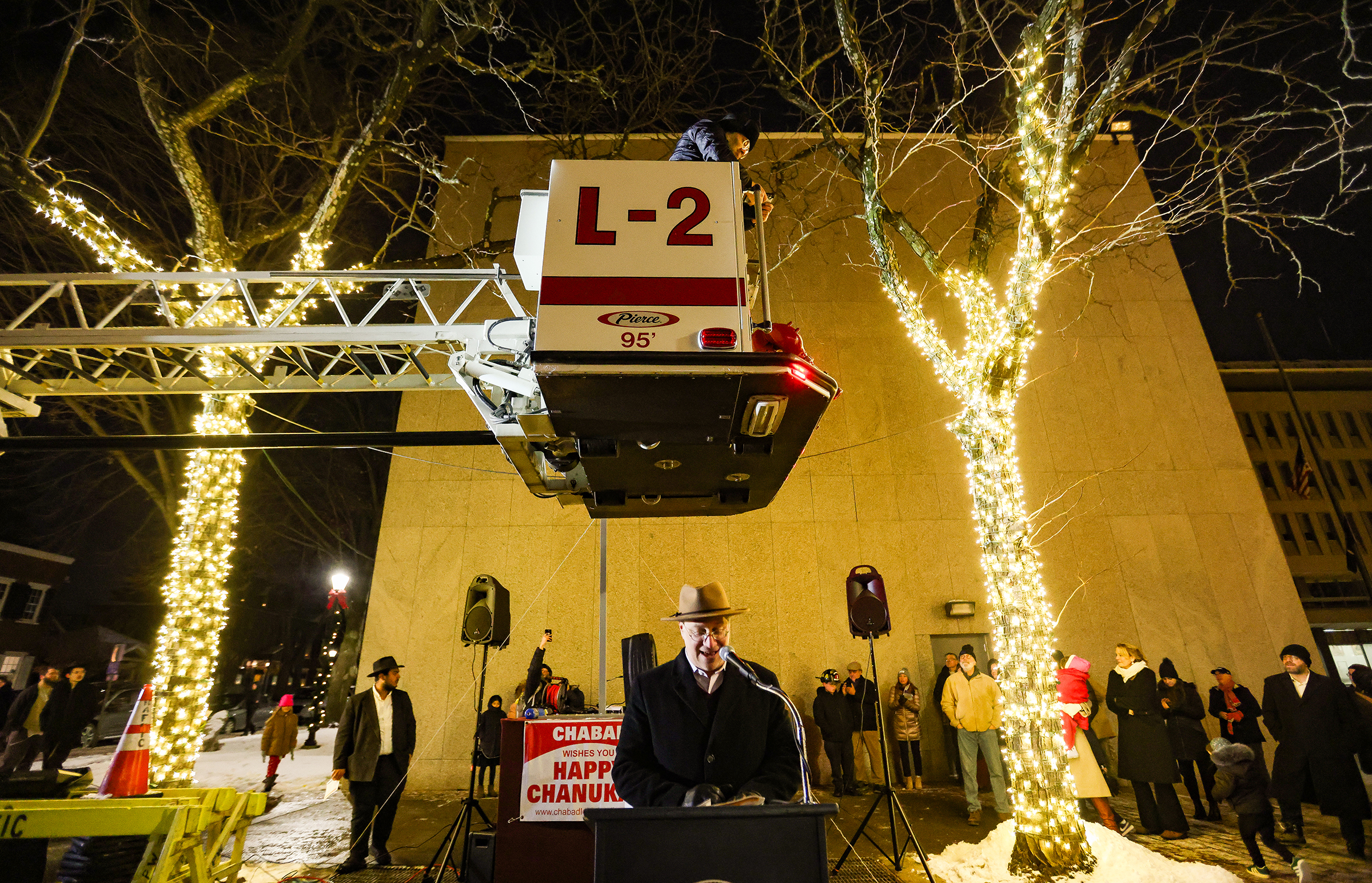 Rabbi Michael Singer of Brith Sholom speaks during the Chabad Lubavitch of the Lehigh Valley celebration of Hanukkah at the "Lighting of Unity" public menorah lighting Monday, Dec. 15, 2025, on Payrow Plaza outside Bethlehem City Hall.