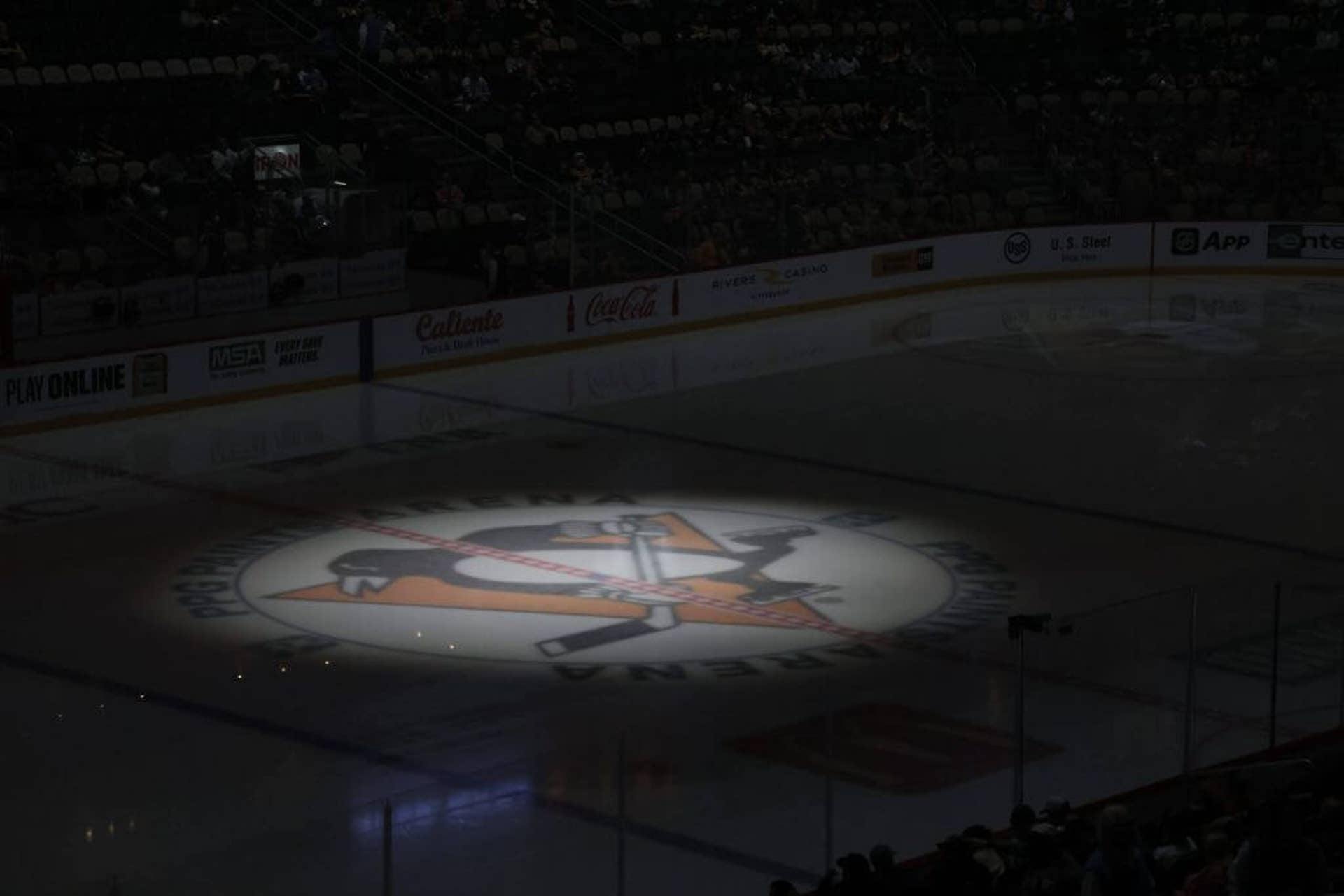 A general view of the logo displayed on center ice during the Pittsburgh Penguins vs Edmonton Oilers game at PPG Paints Arena.
