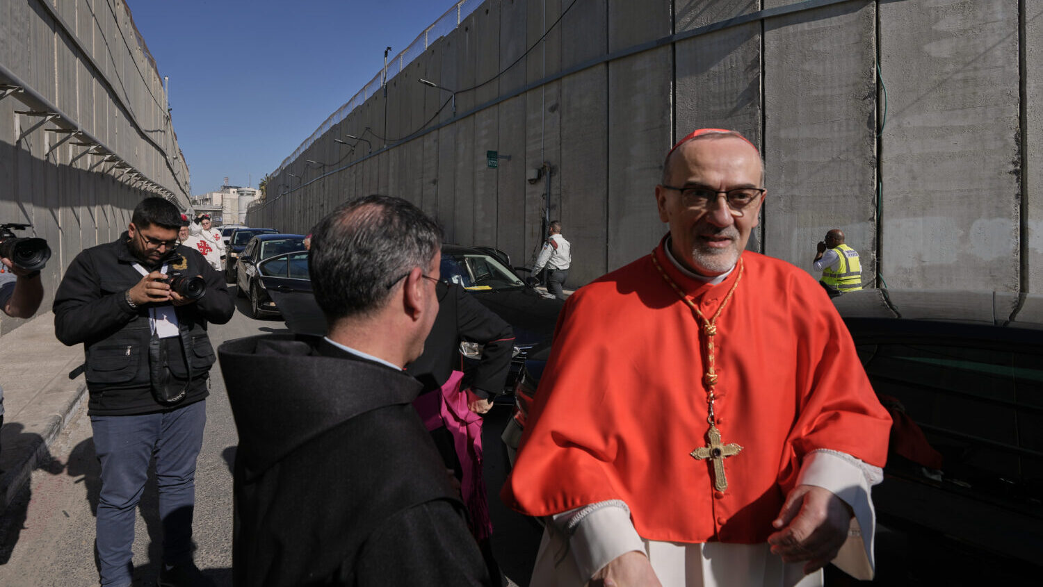 Latin Patriarch Pierbattista Pizzaballa, the top Catholic clergyman in the Holy Land, is received b...