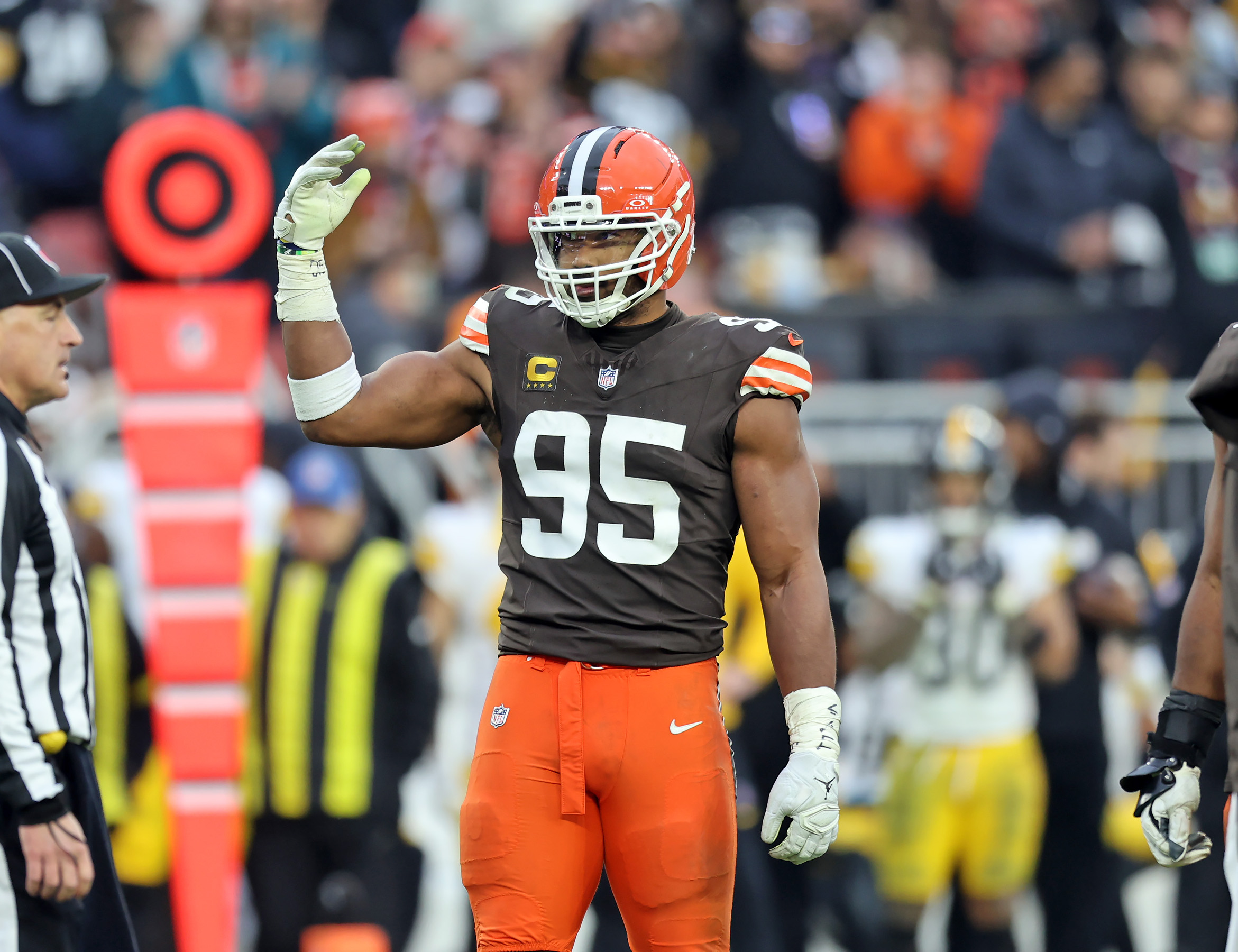Cleveland Browns defensive end Myles Garrett gets the crowd pumped up against the Pittsburgh Steelers in the second half of play. 