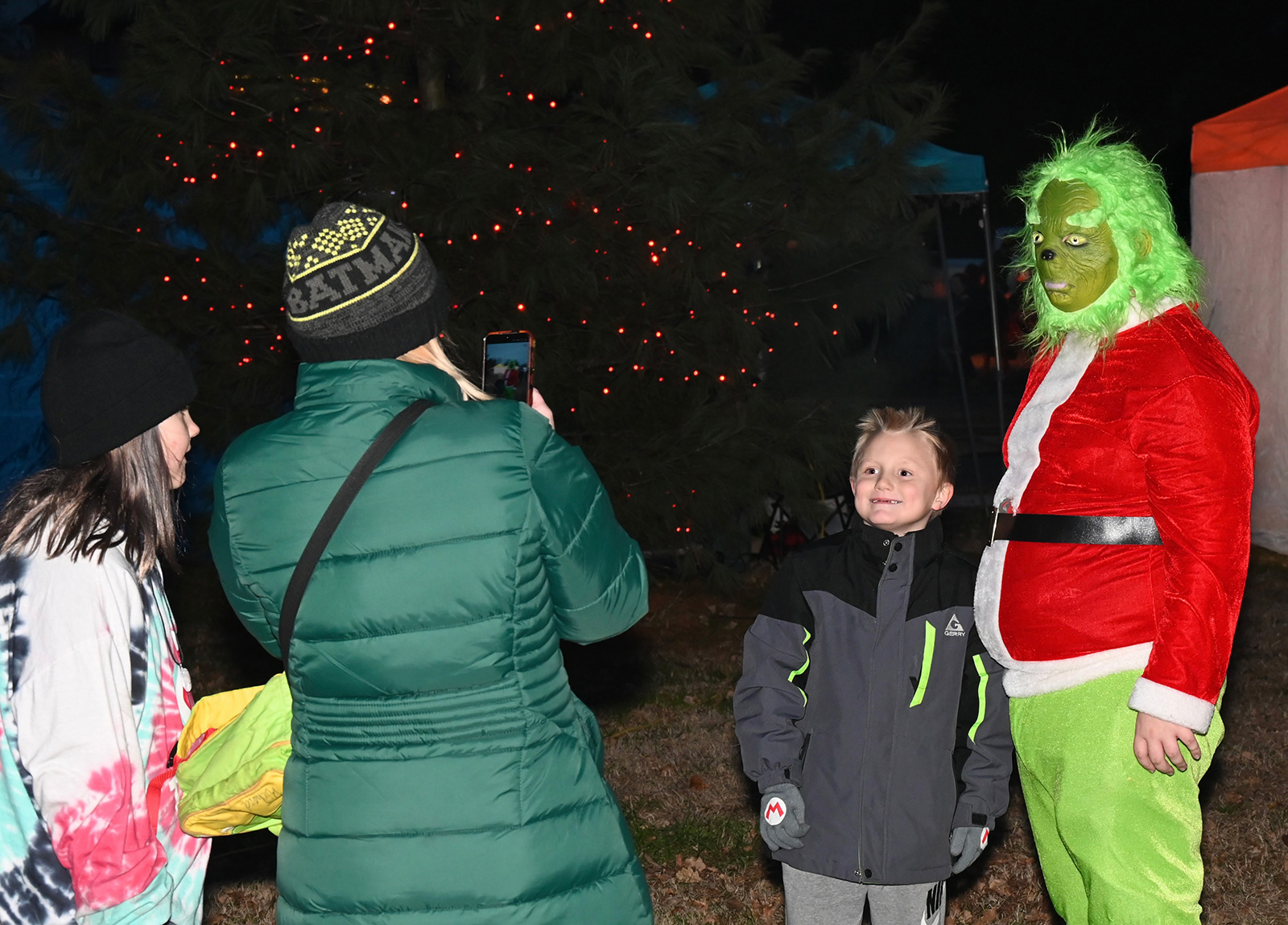 The Grinch poses for photos during Christmas in Birdsboro on...