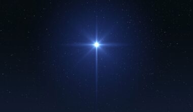 A bright star twinkles in a deep blue night sky