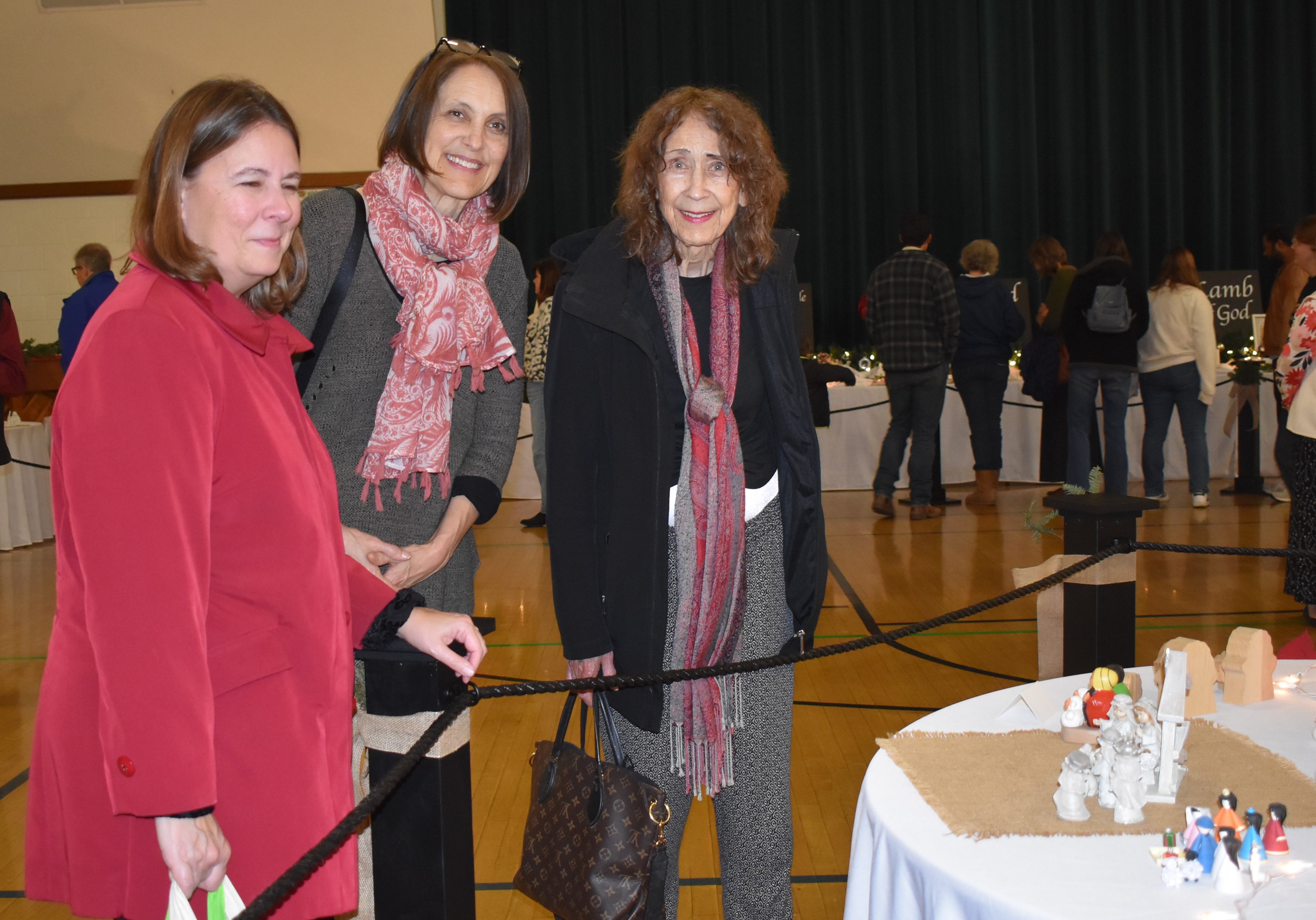 Elisa Marrone, Valerie Stander and Elon Mangelson looking at some...