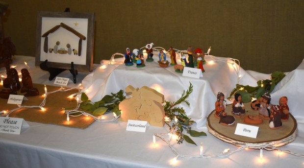 Among the hundreds of nativity scenes from around the world were these from the Philippines, San Diego beach art, Switzerland, France and Peru. (Elizabeth Marie Himchak)